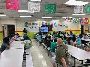 G.G. Students and staff viewing Go Green presentation